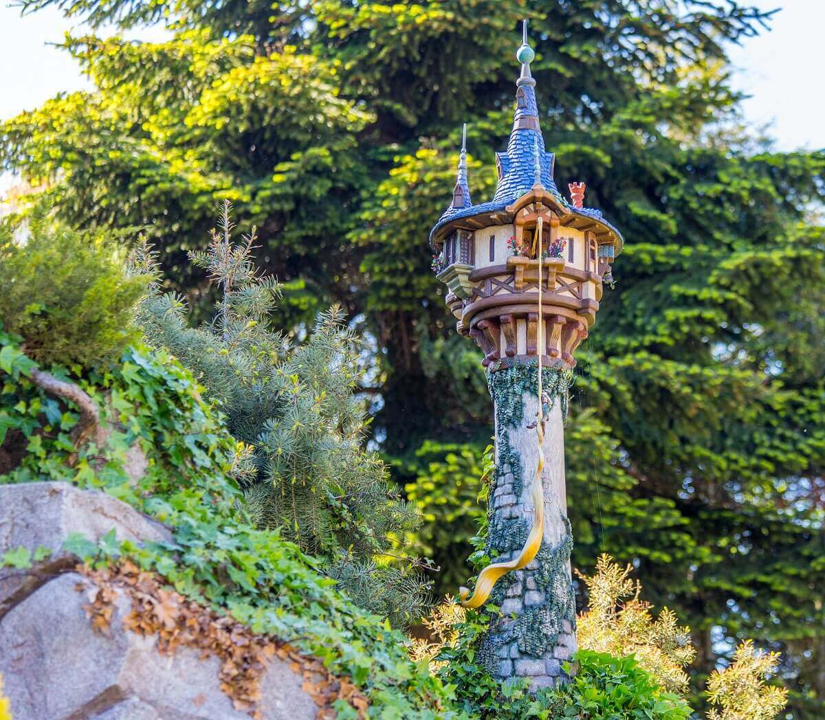 Rapunzel's Tower at Le Pays des Contes de Fees a replica of Rapunzel's tower at the fairytale boat ride in Fantasyland