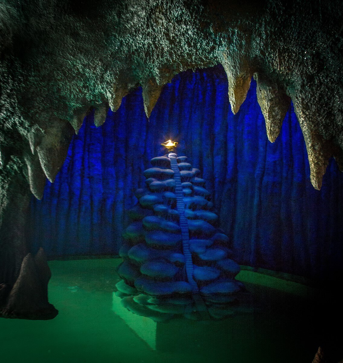 The magic lamp at Le Pays des Contes de Fees in a small cave the magic lamp from Disney's Aladdin shines during the fairytale boat trip