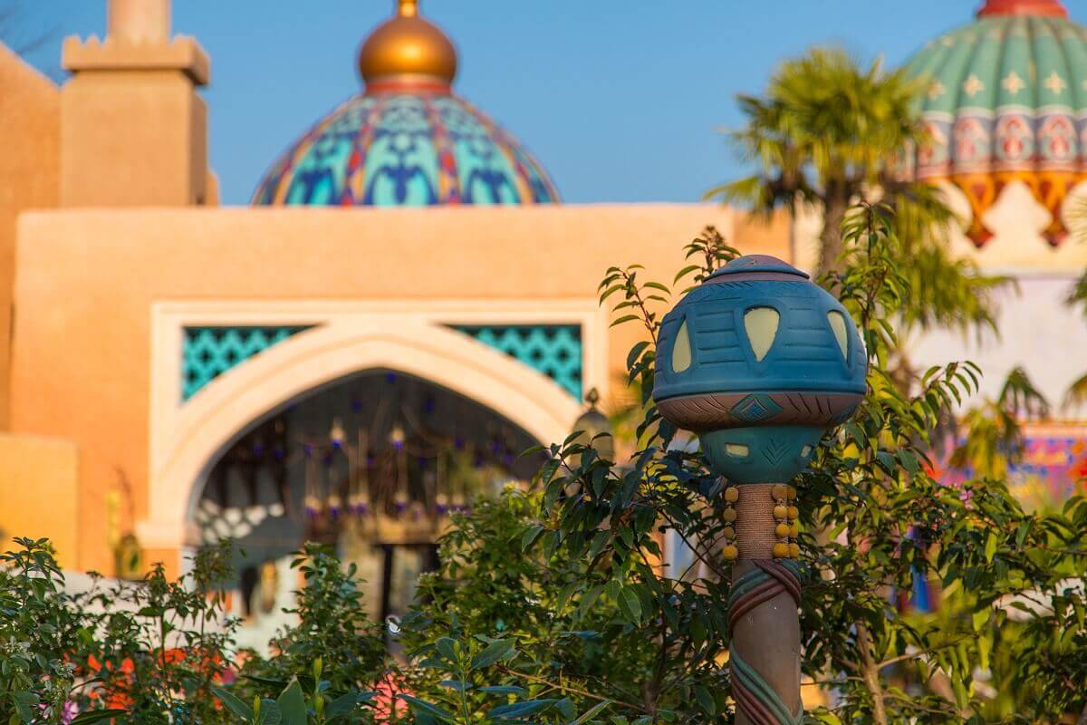 Colorful lamp at Arabian bazaar View of a colorful lamp with the passage to Central Plaza in the background