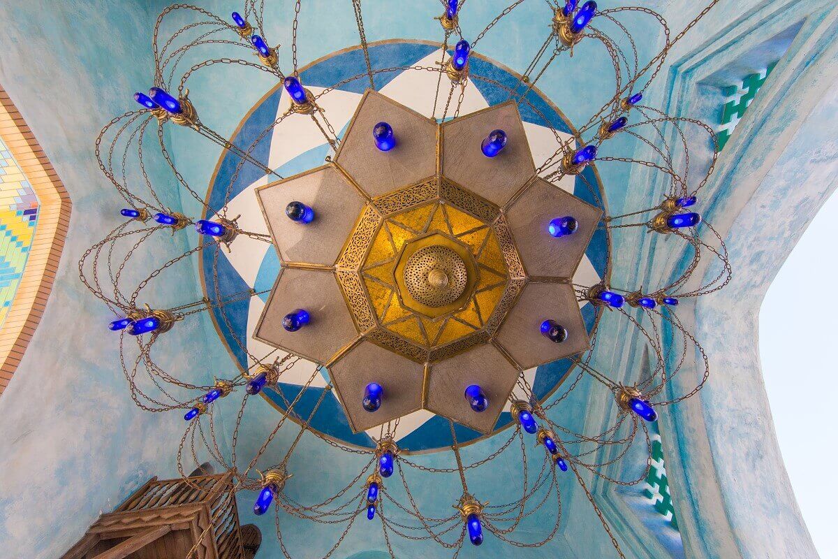 Ornate candlestick View from below of the richly decorated oriental candelabra at the passage to the Arabian bazaar