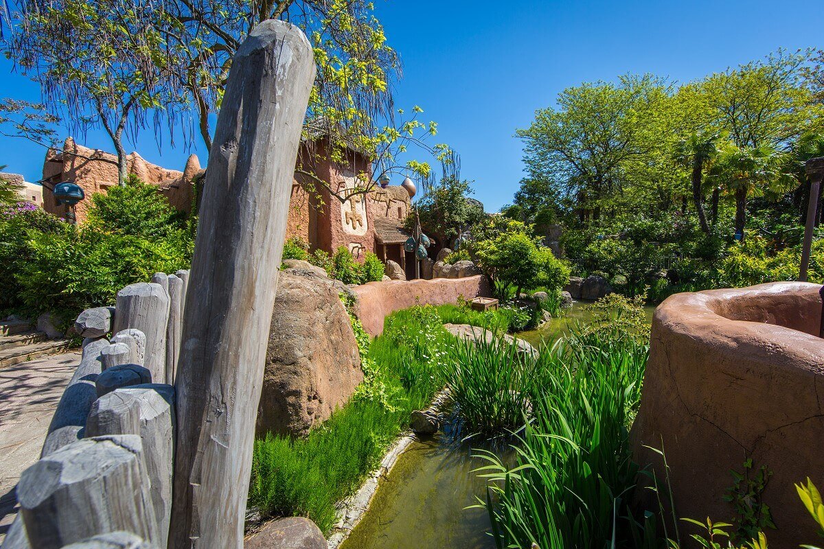 View into the area of the Africa area View of a small body of water and many plants in the African area of Adventureland