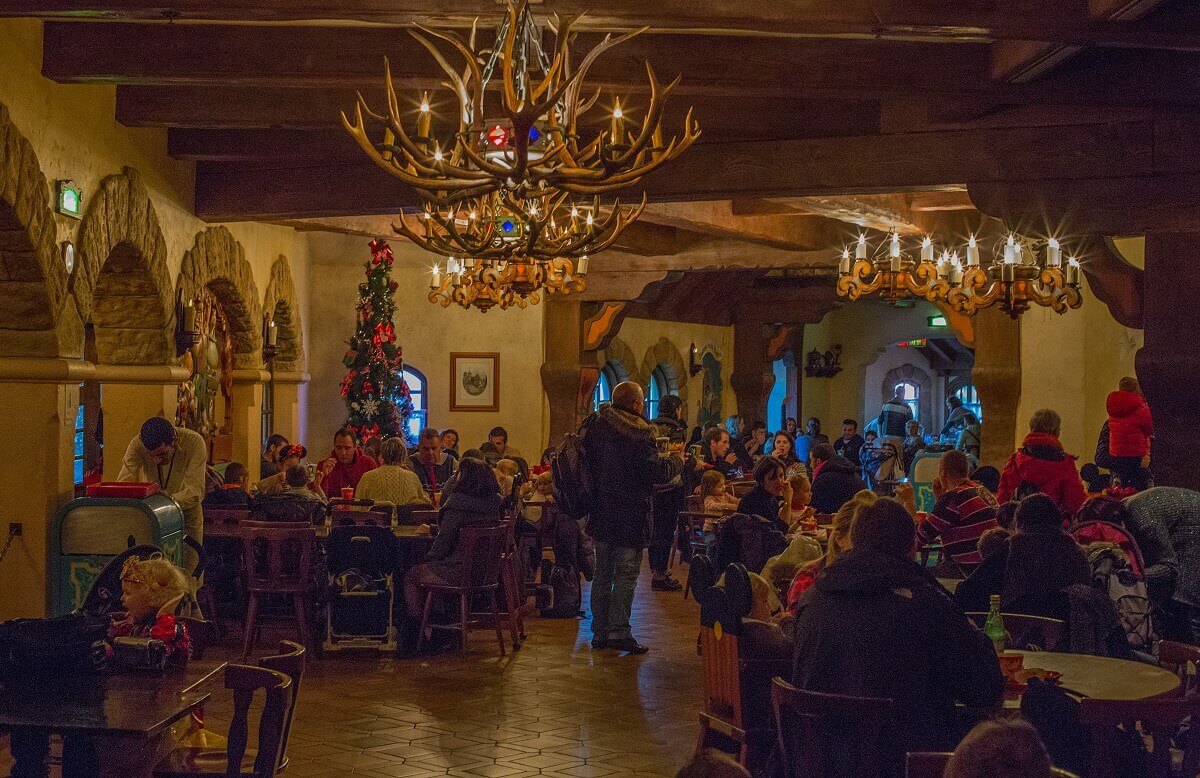 Interior view of the Chalet de la Marionette View into the interior of the Chalet de la Marionette with several tables and christmas decoration