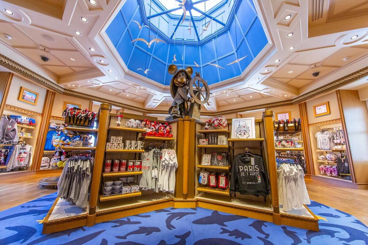 Hotel shop at the Newport Bay Club In the middle of the shop there is a big Mickey sailor statue on a pedestal.