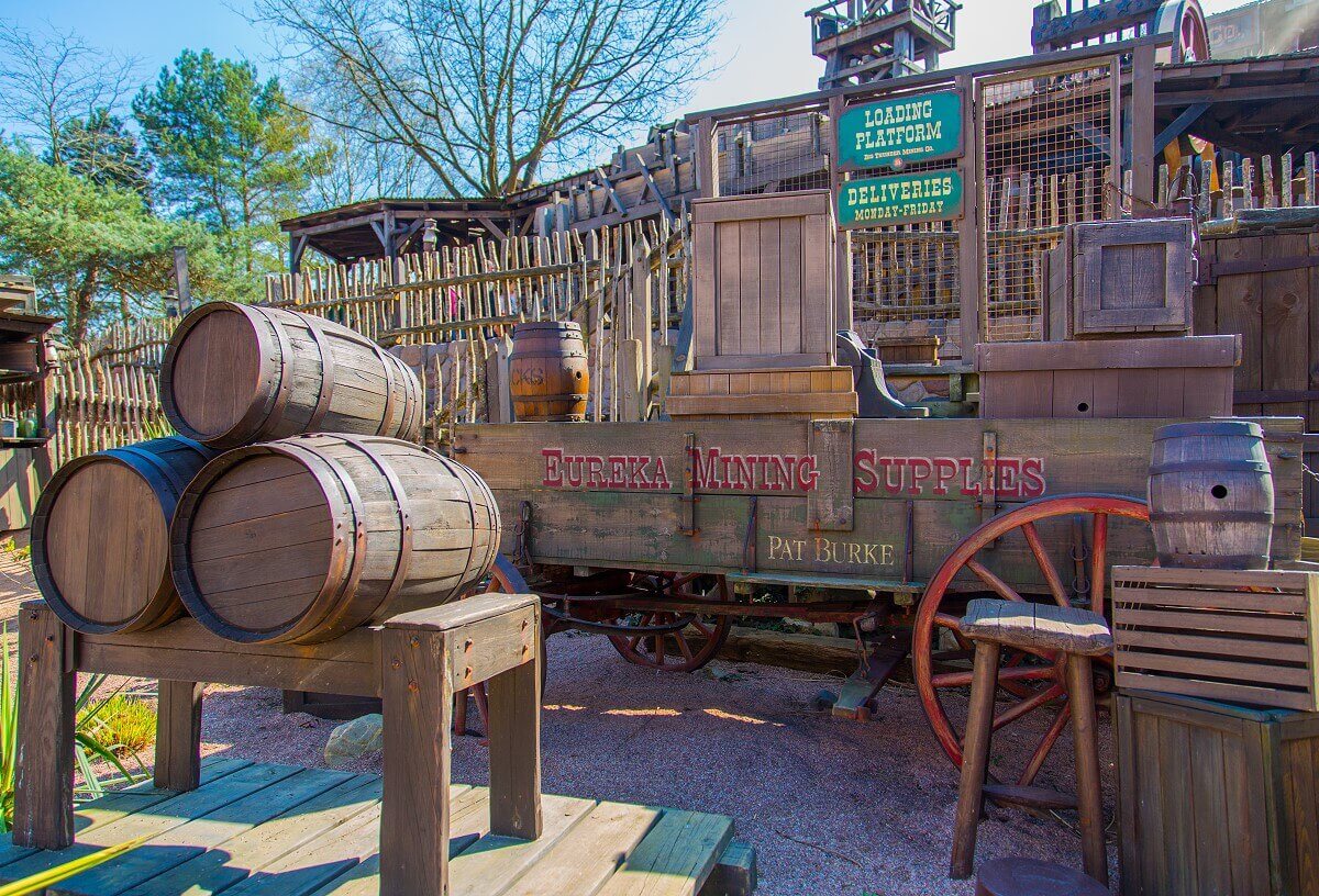 Tools of the Eureka Mining Company In the waiting area of the Big Thunder Mountain roller coaster, there are wooden boxes and barrels on a cart labeled Eureka Mining Supplies