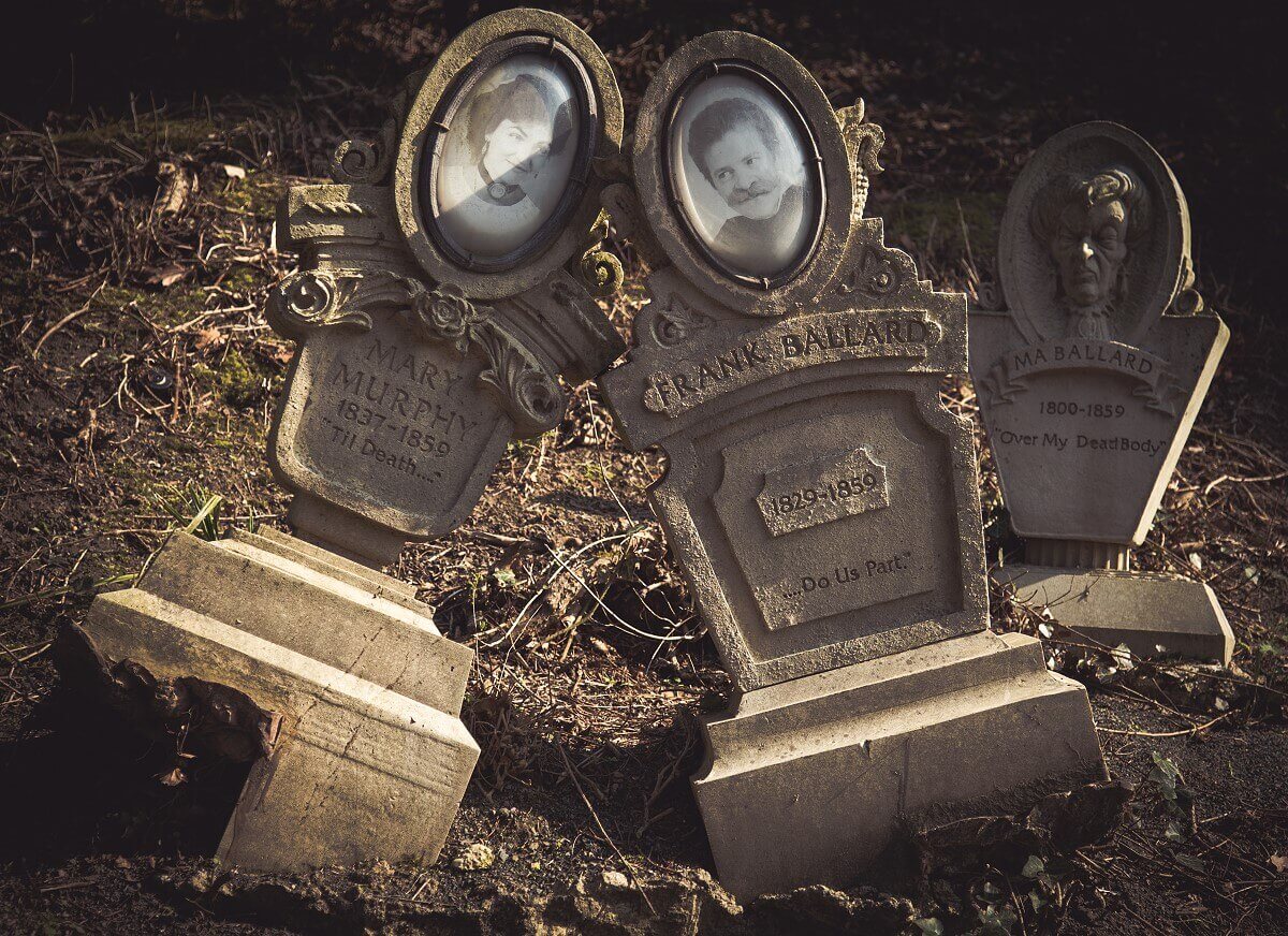 Angled gravestones The gravestones of a pair of deceased lovers lean against each other in the cemetery