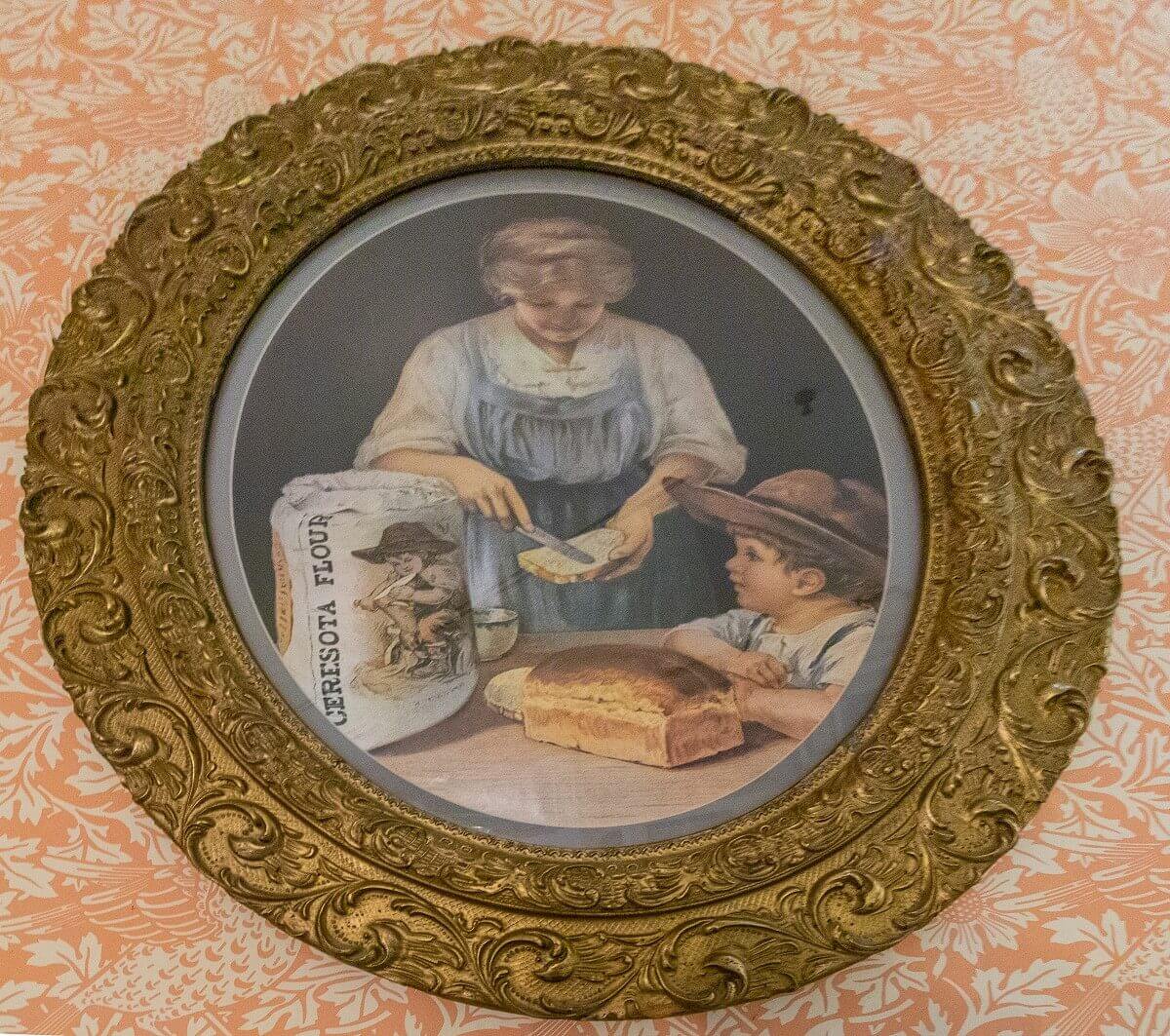 Advertising picture for flour Advertising image for Ceresota brand flour showing a mother spreading a sandwich on a child's bread.