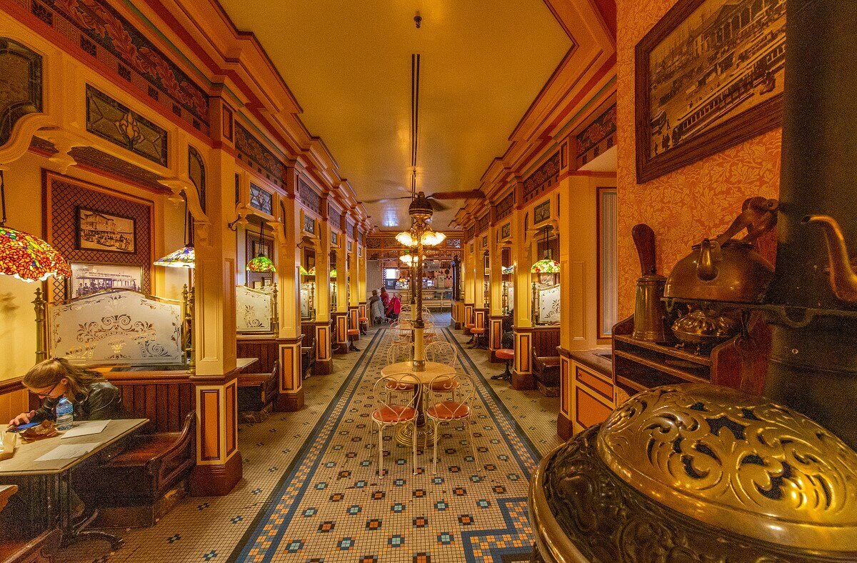 The guest room from the entrance of the Liberty Arcade The guest room from the entrance of the Liberty Arcade, in the foreground on the right a wrought iron stove