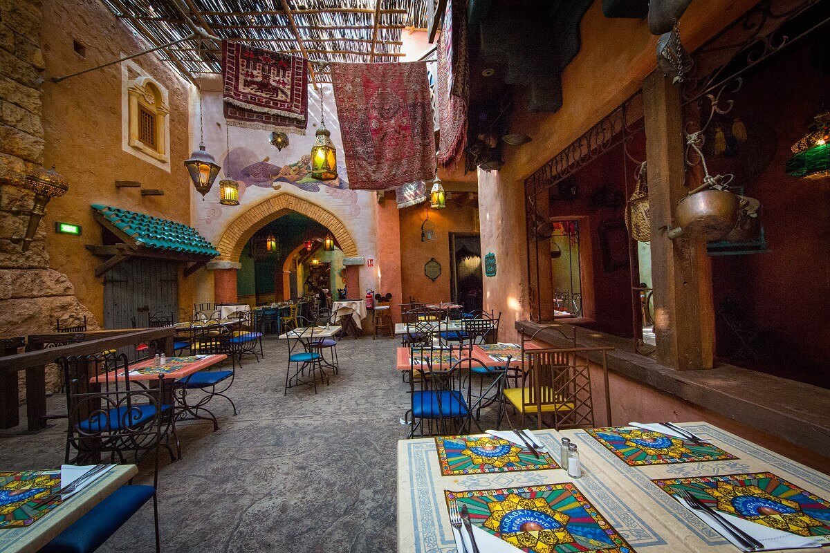 Interior view of the Agrabah Café Area with several tables in the restaurant