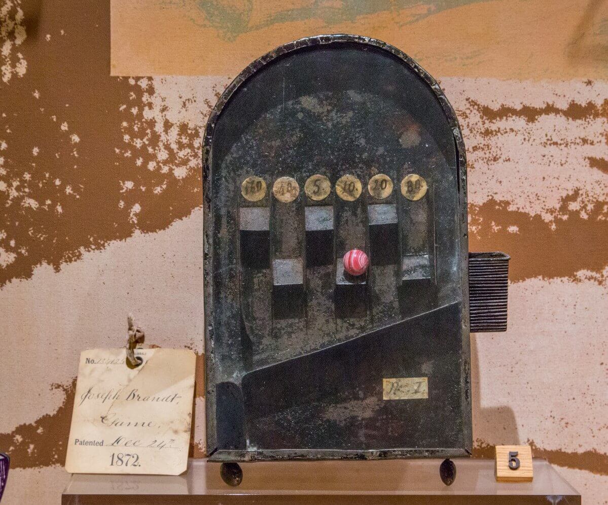 Patent model of an early slot machine Patent model of an early slot machine from 1872