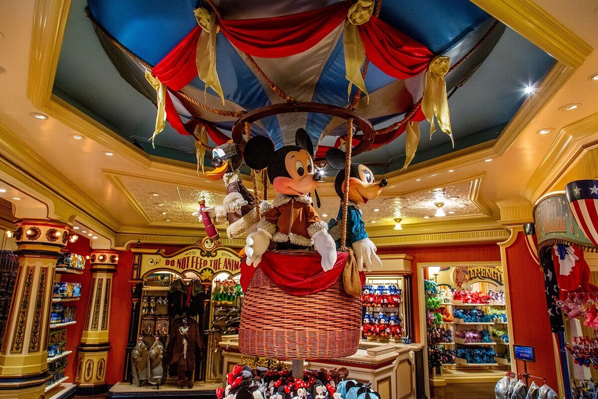 Mickey Mouse in balloon Mickey Mouse stands in the gondola of the balloon and wears a brown, thickly lined leather jacket