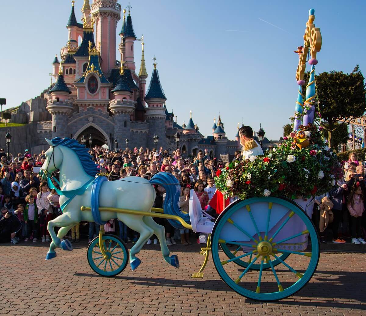 Princess carriage at Disneyland Paris A princess carriage is pulled by a horse in front of Sleeping Beauty's castle