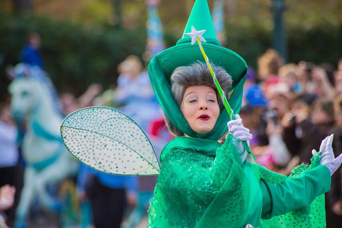 Fairy Fauna works her magic The fairy Fauna in her green robe looks enchanted and waves her magic wand