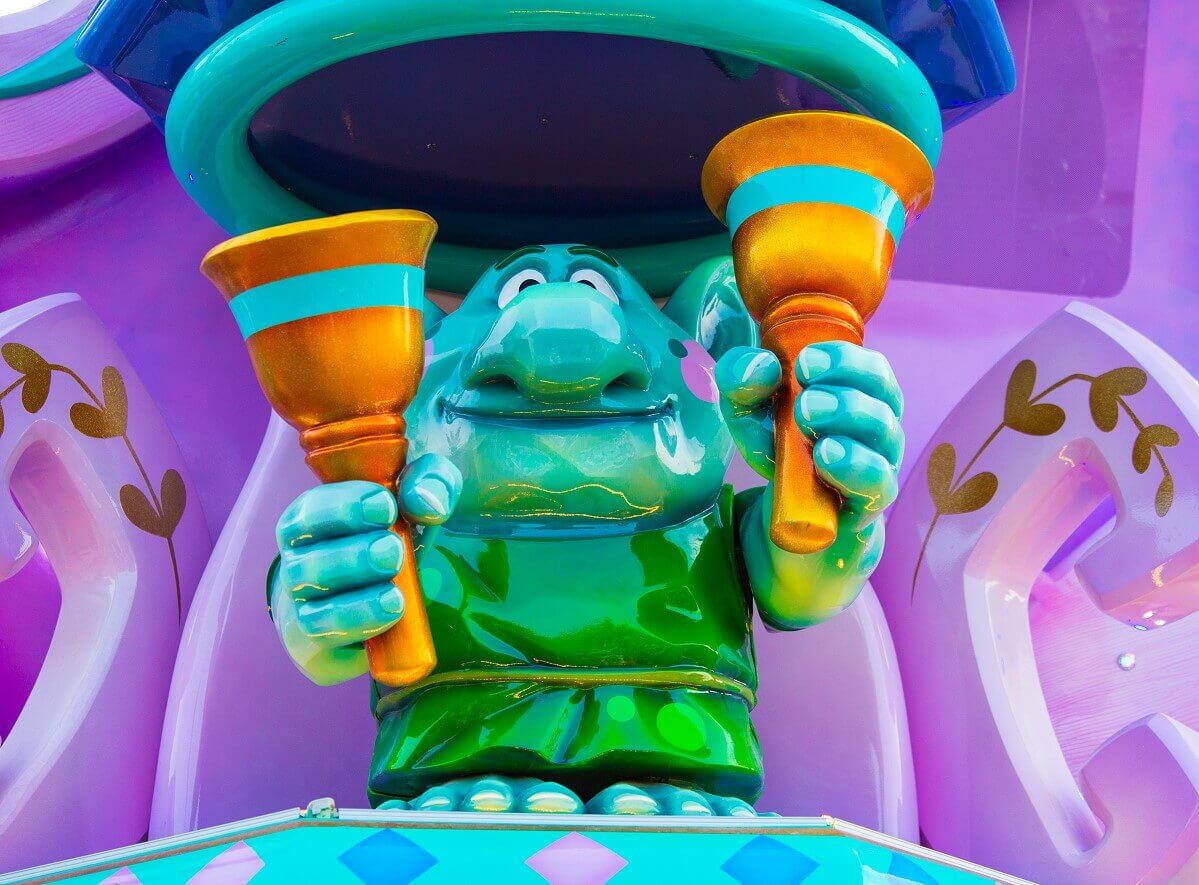 Troll from The Ice Queen at the back of the parade float is a little troll ringing little bells