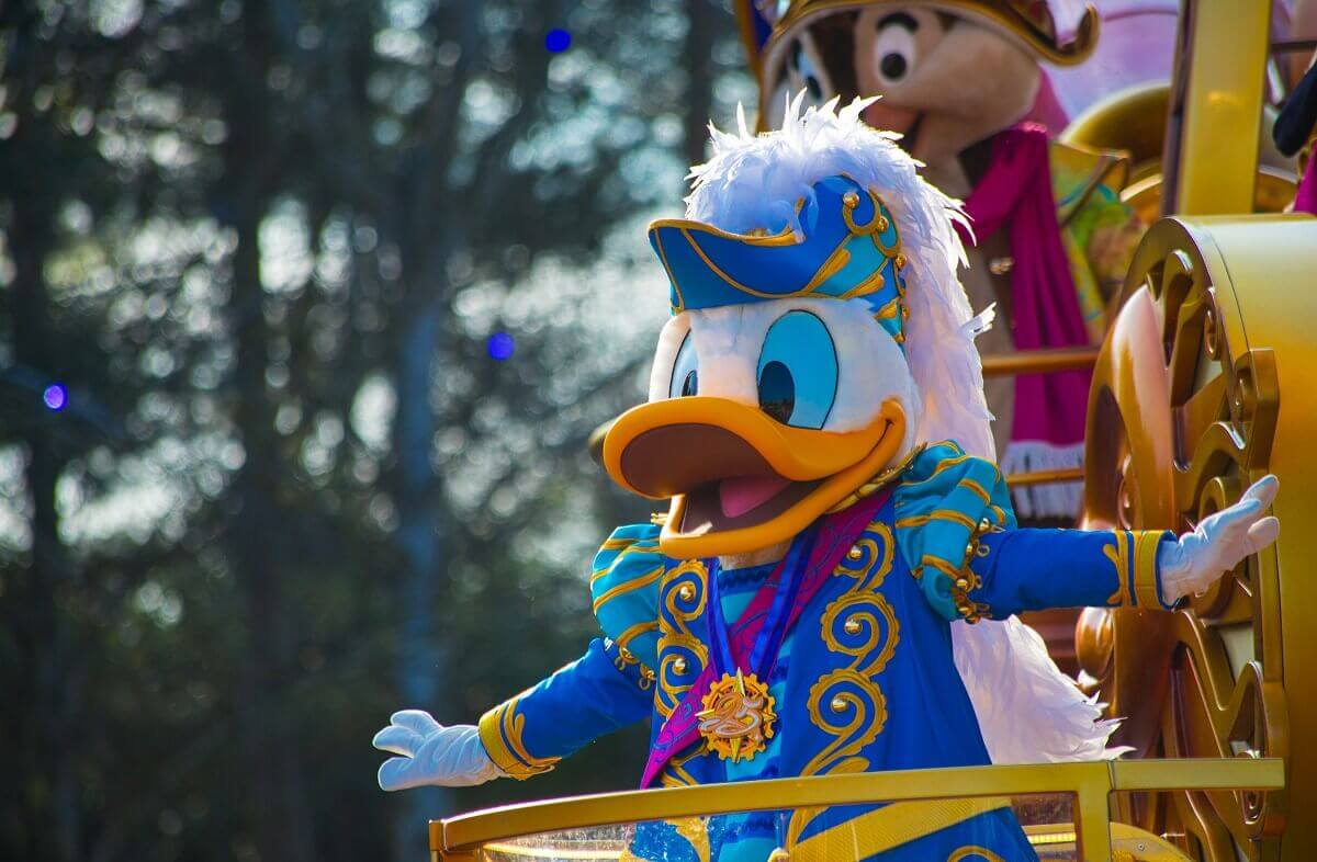Donald Duck with Napoleon hat Donald Duck wearing a Napoleon hat adorned with a long plume of feathers and a blue and gold coat