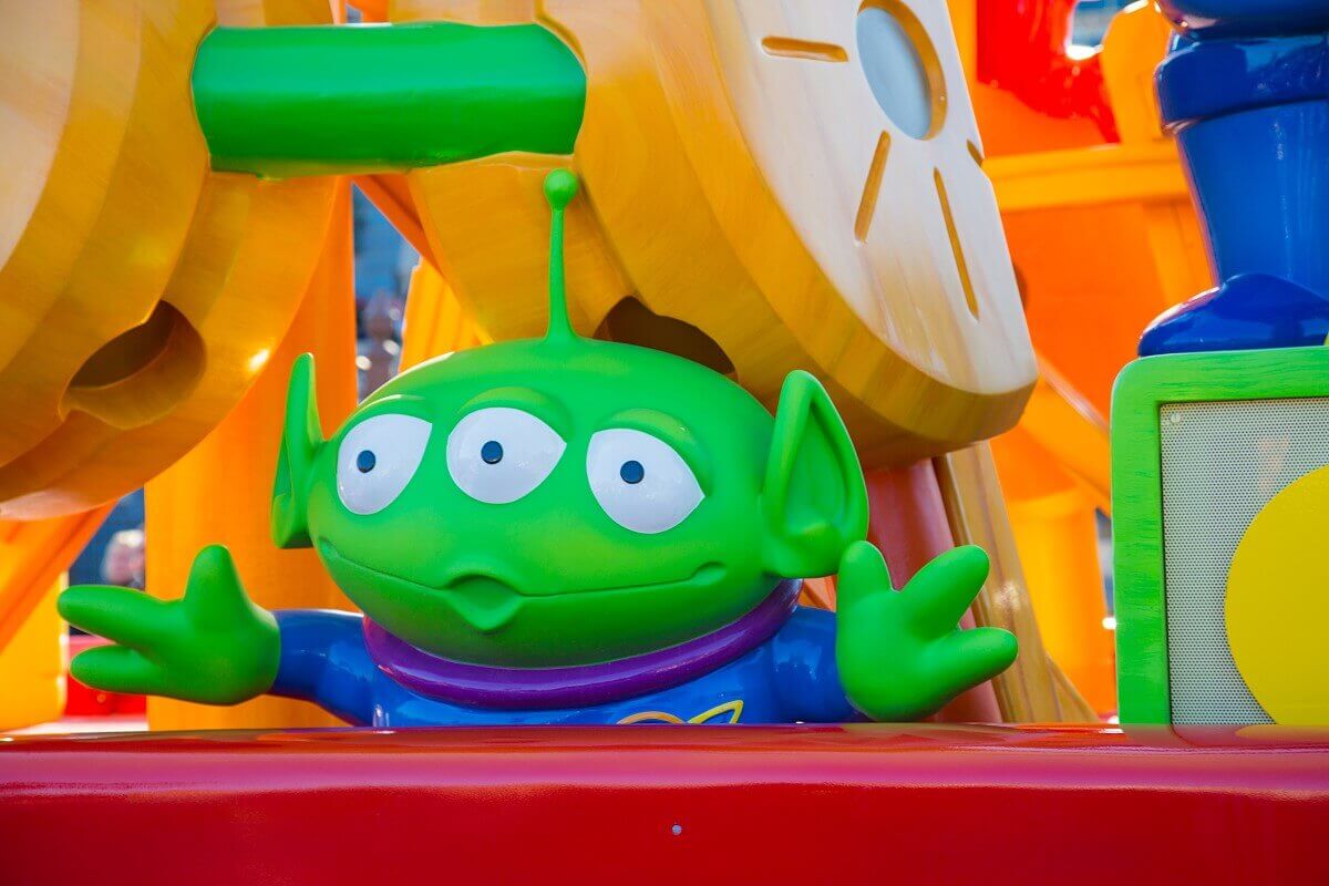 Green Alien from Toy Story A green alien with three eyes beckons