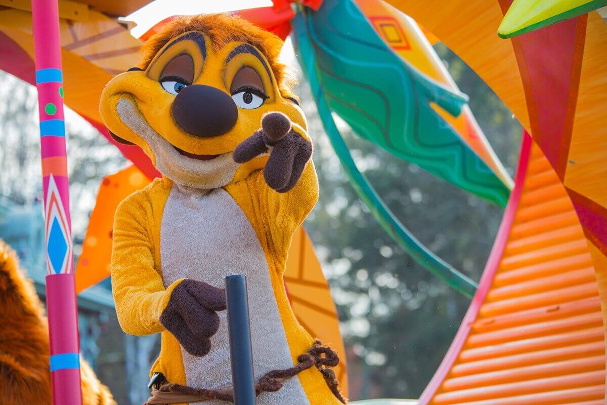 Timon greets Meerkat Timon greets with outstretched paw from the parade float