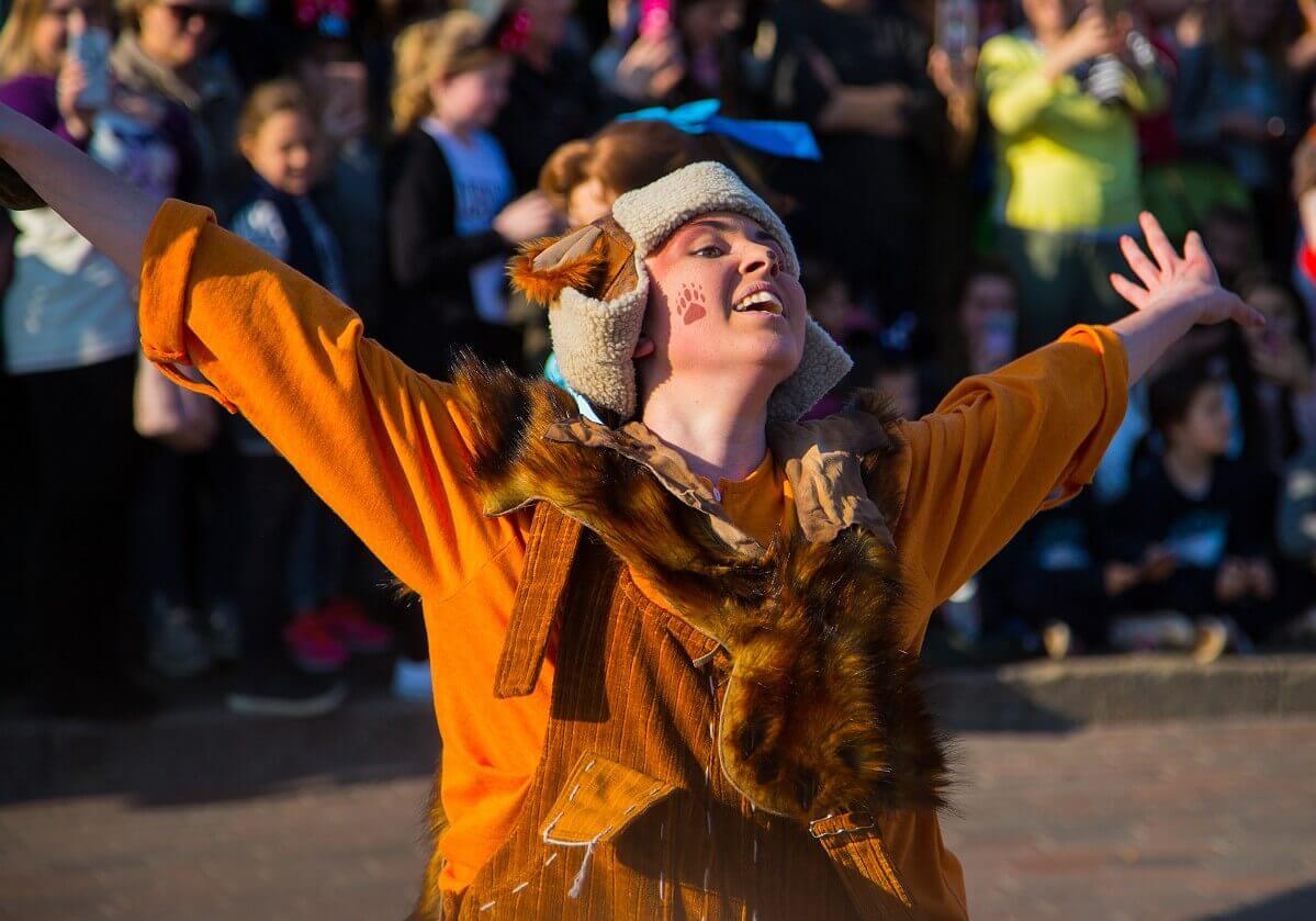 Dancer in animal costume A dancer in a brown animal costume at Disney Stars on Parade