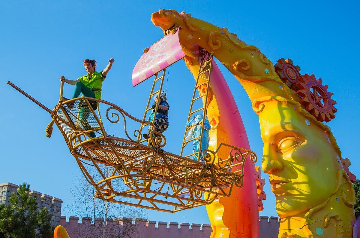 Peter Pan's flying ship Peter Pan stands in the bow of his flying ship, which is attached to the top of a huge crescent moon