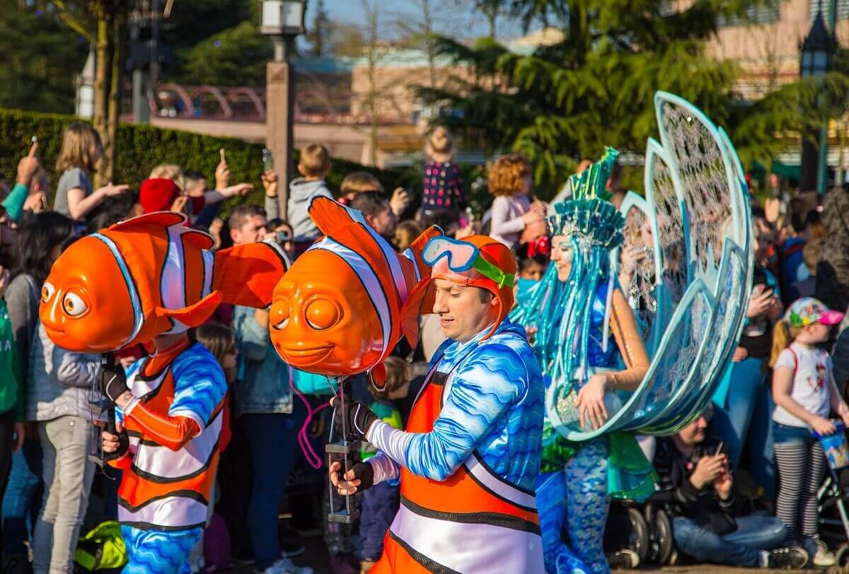 Dancer with Nemo figures Two dancers wearing clown fish figures