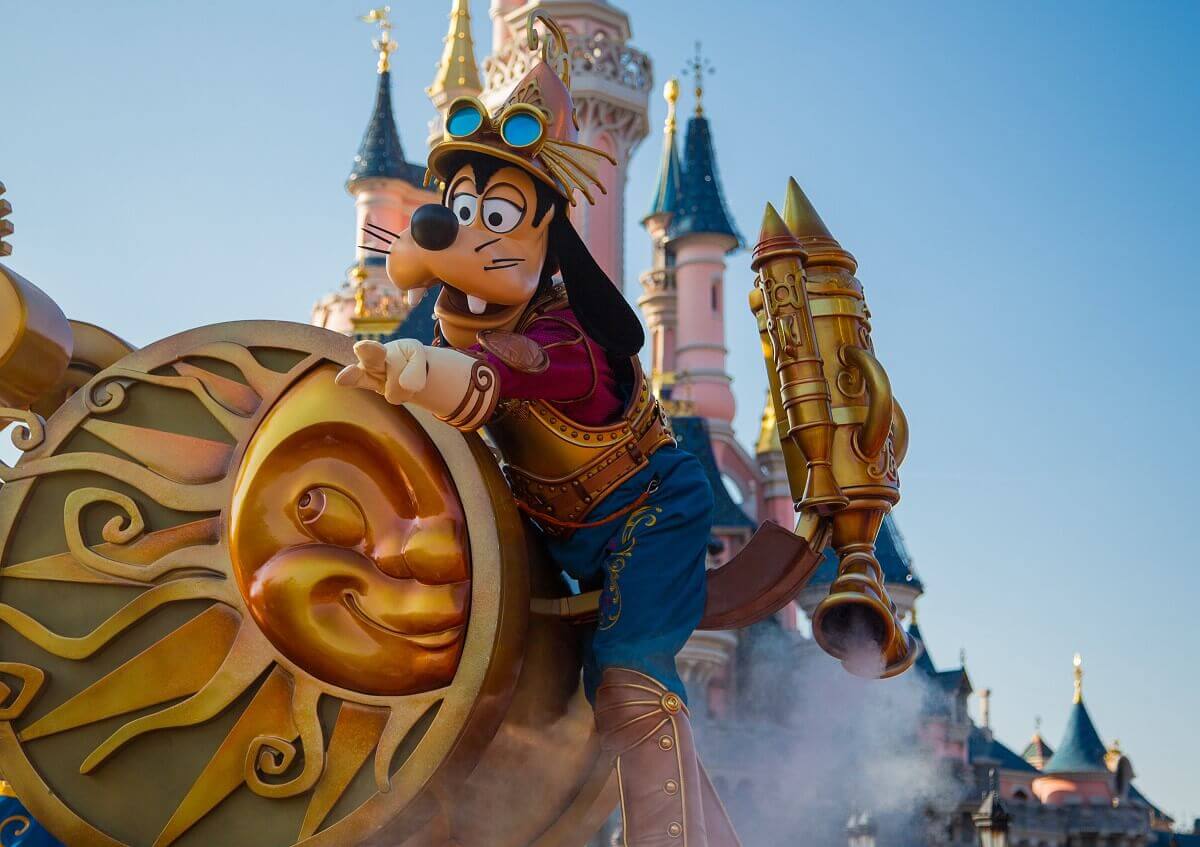 Goofy on the rocket Goofy in golden-bronze steampunk outfit sits on a rocket with smoke pouring out of it