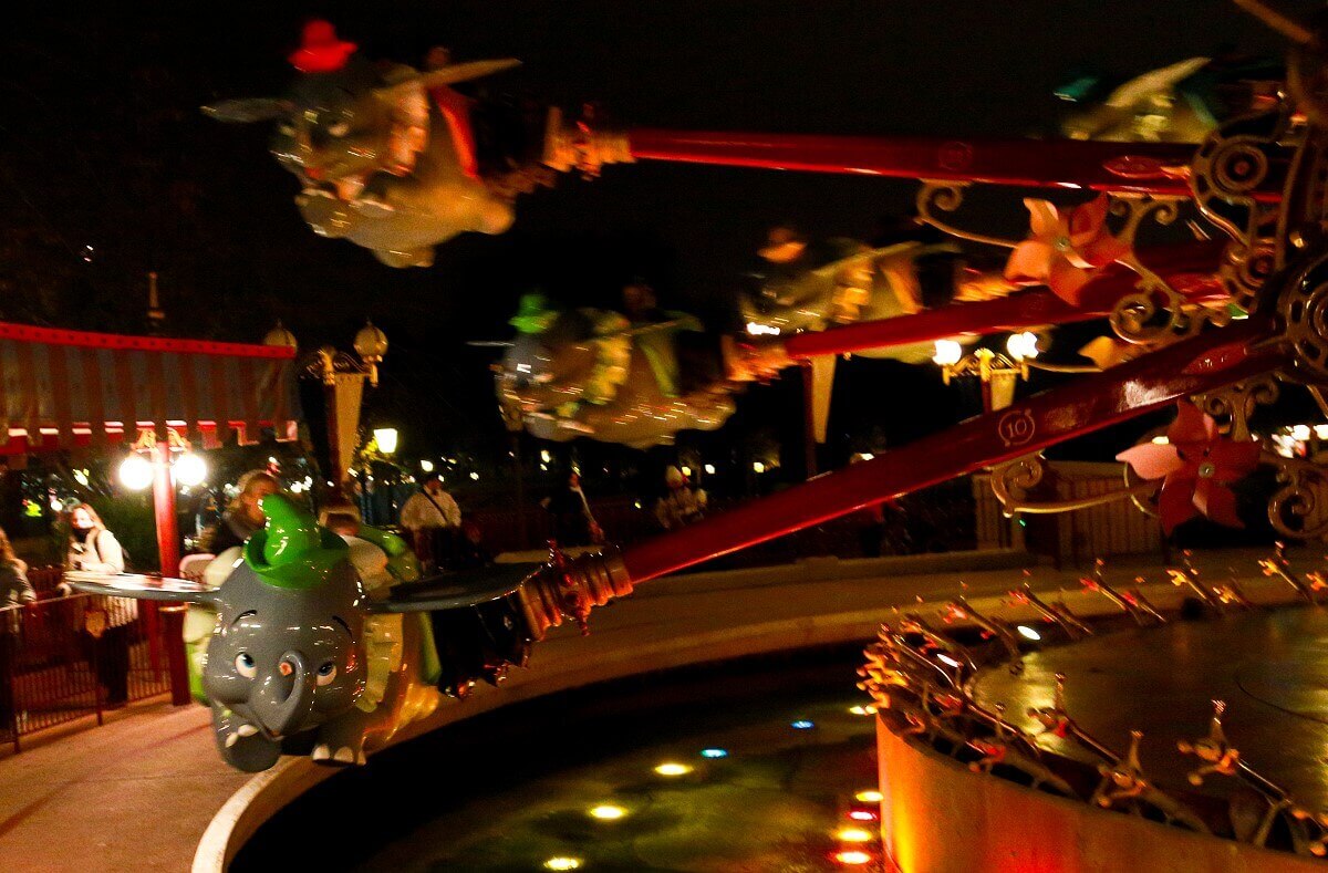Night flight with Dumbo View from a car of the carousel Dumbo - The Flying Elephant to other flying Dumbos at night