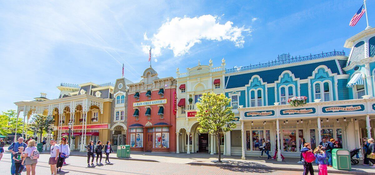 The facade of the Emporium in wide angle The facade of the Emporium in wide angle on Main Street Vehicles from