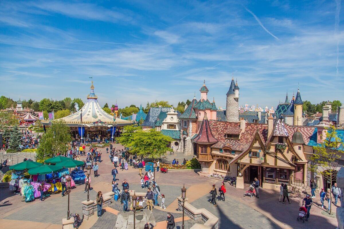 Above the roofs of Fantasyland View from Sleeping Beauty Castle to several buildings of Fantasyland and the carousel