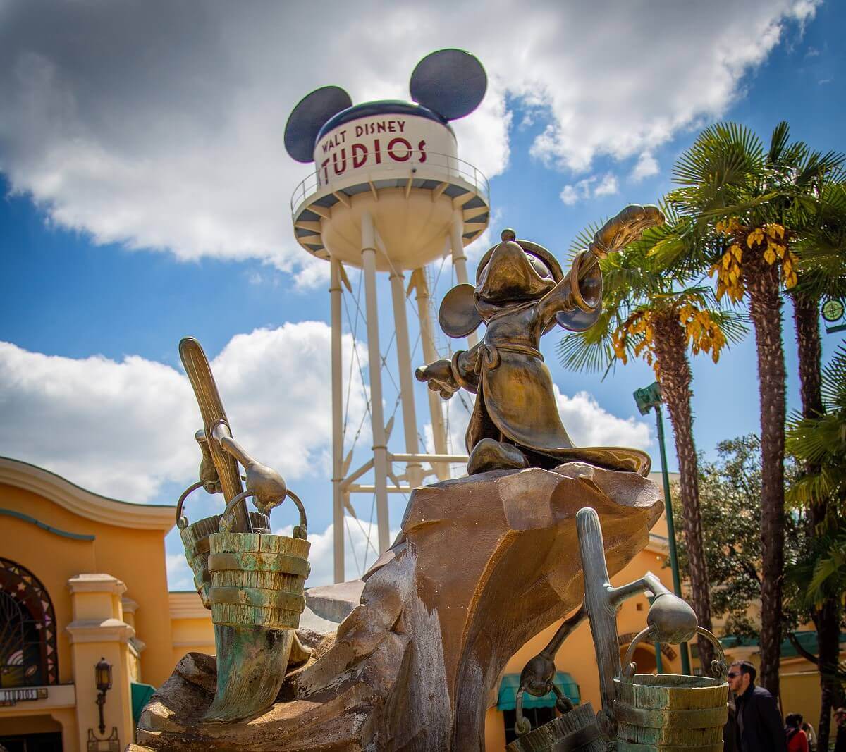 Mickey as a sorcerer's apprentice Mickey as a sorcerer's apprentice, a broom with water buckets and in the background the Earfell Tower