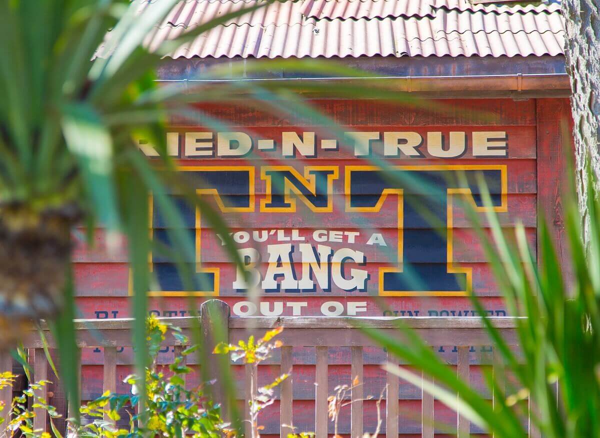 Building of the Shooting Gallery Side view of the Shooting Gallery building with a large advertising slogan