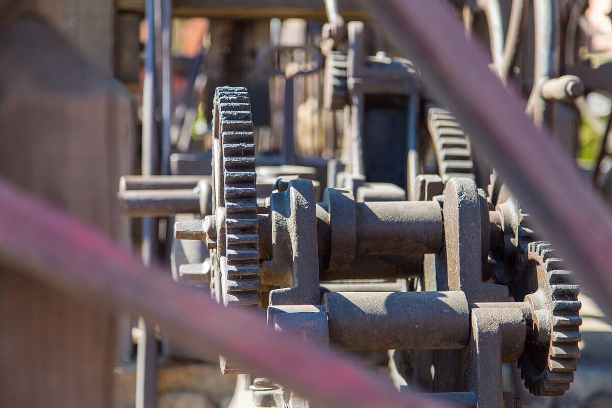 A machine in Frontierland View of a rusty old machine with gears in Frontierland