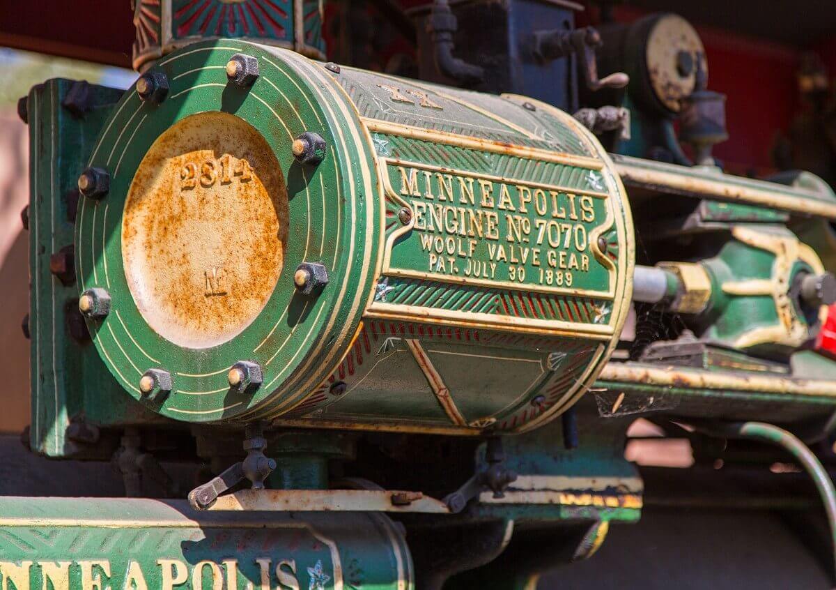 Details of an old tractor Close-up of an old green tractor in Frontierland