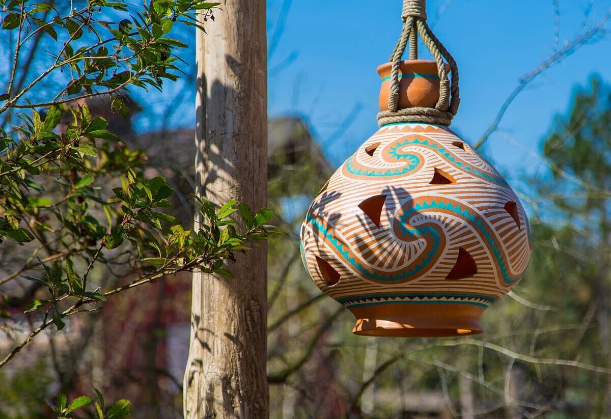 clay lantern A bulbous lantern made of clay with fancy painting