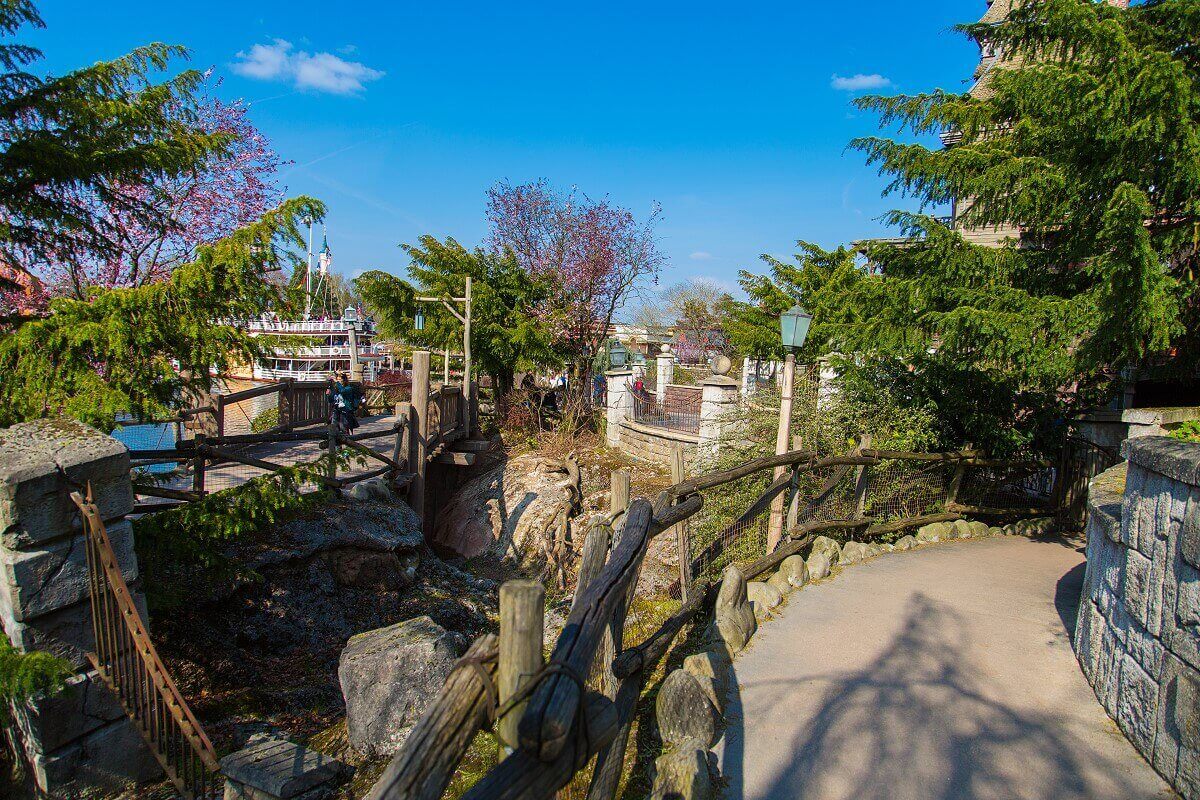 Way from Boot Hill back to Frontierland View of a narrow path from the cemetery near Phantom Manor back to Frontierland