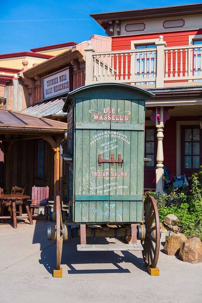 Car of a travelling pharmacist In front of the Silver Spur Steakhouse is the wooden wagon of Doc Wassell, the traveling pharmacist