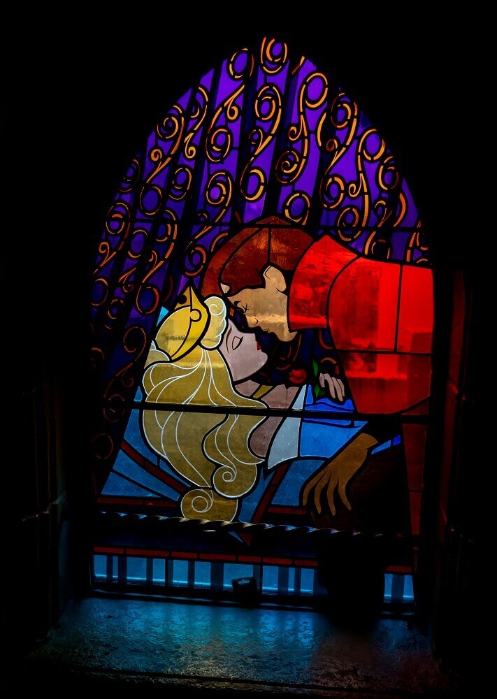 Stained Glass Window The True Love Kiss On a stained glass window the scene is shown in which the sleeping Sleeping Beauty is kissed awake by a prince