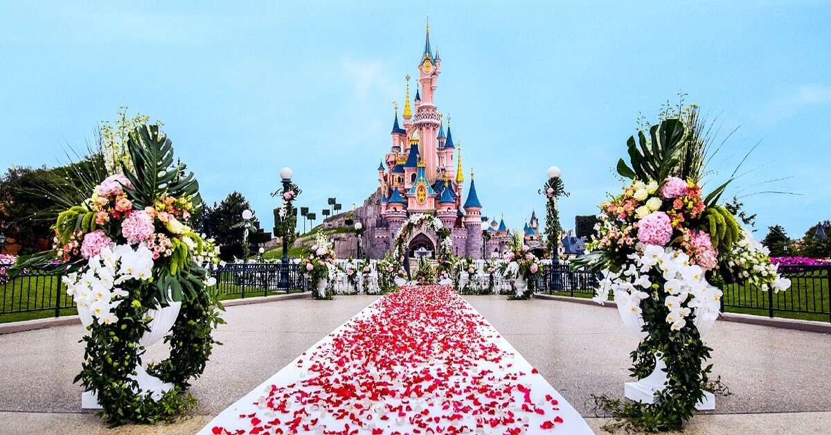 Getting married in Disneyland Paris Getting married in Disneyland Paris is like a fairy tale: romantic decorations in front of Sleeping Beauty's Castle
