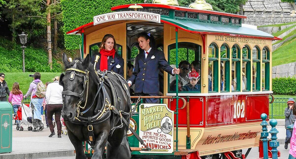 Horse-drawn tram in front of the castle hill Horse-drawn tram in front of the castle hill