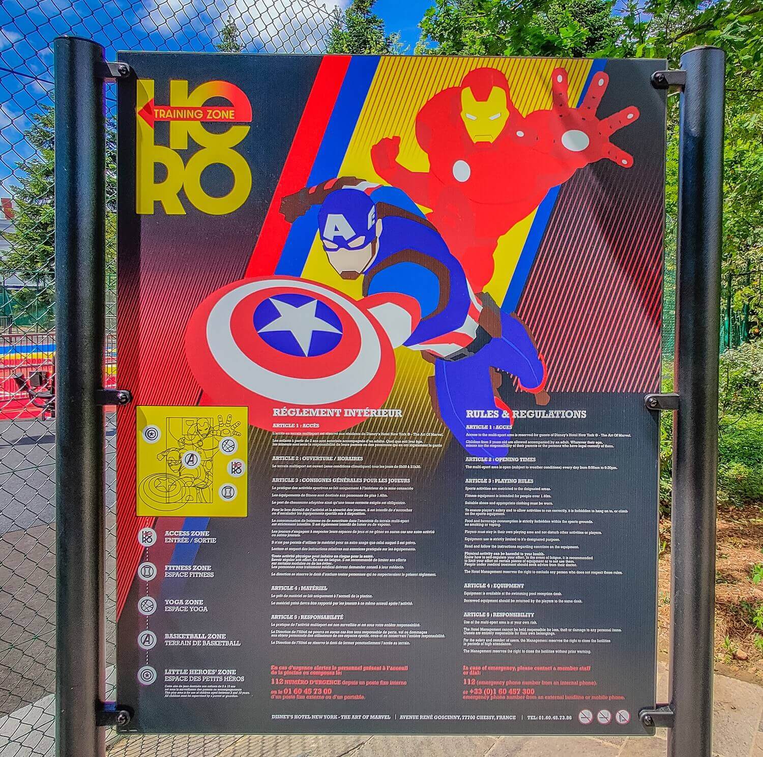 Hero Zone Sign Close-up of a Hero Training Zone sign showing the different activity zones and a rule text. Captain America decorates the background image.