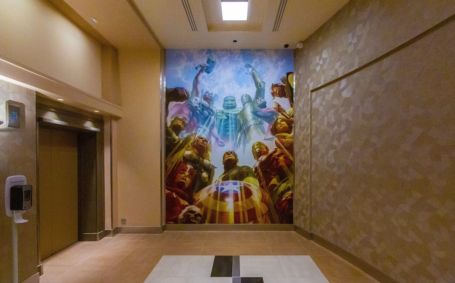 Great picture with Marvel heroes A life-size picture with Marvel heroes next to the elevator