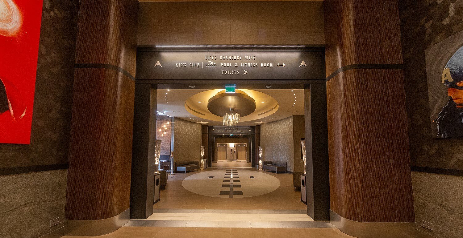 Hotel corridor The hallway in the hotel, standing lamps and benches can be seen on the sides