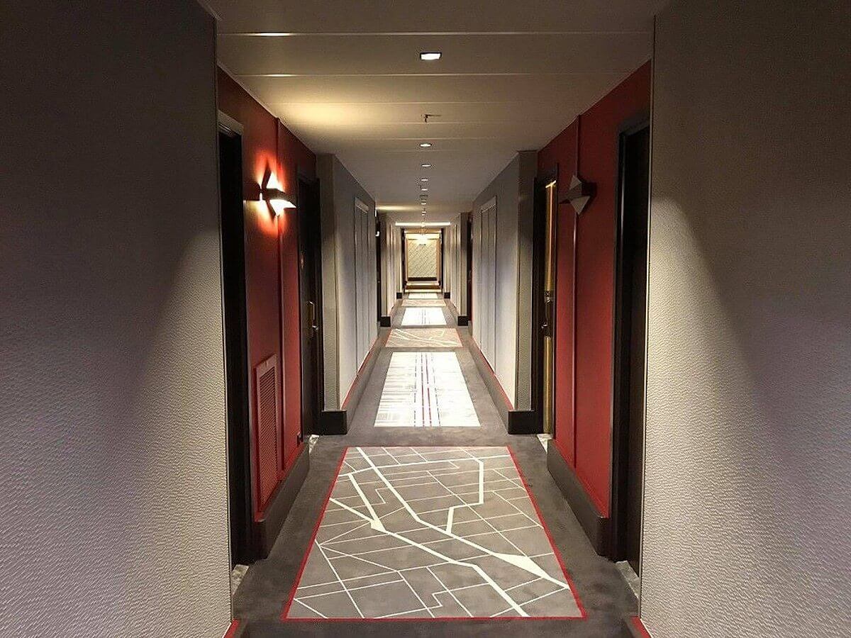 A hallway at Disney's Hotel New York - The Art of Marvel View down a hallway at Disney's Hotel New York - The Art of Marvel