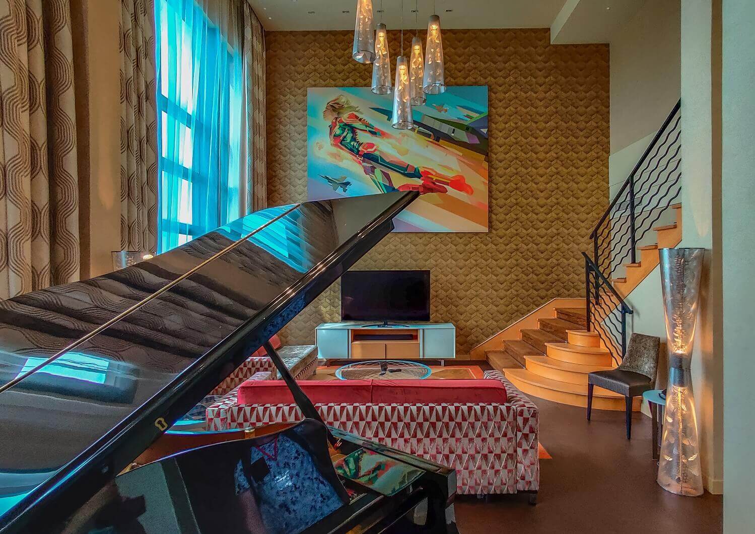 Presidential Suite View into the living area of the suite, a piano can be seen in the foreground