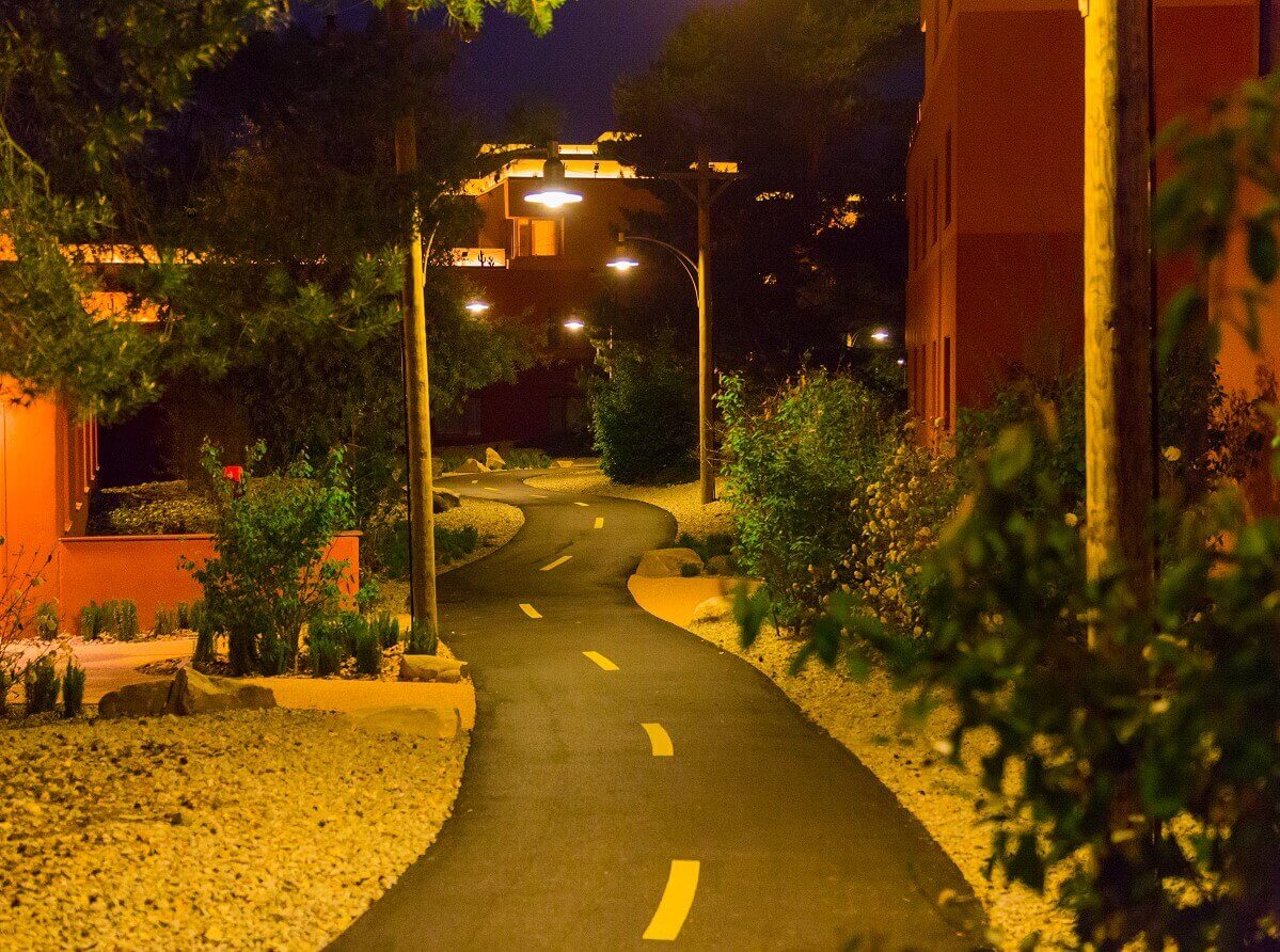 Hotel building Santa Fe at night with Route 66 Route 66 winds through the Mexican-looking landscape of hotel buildings at night.