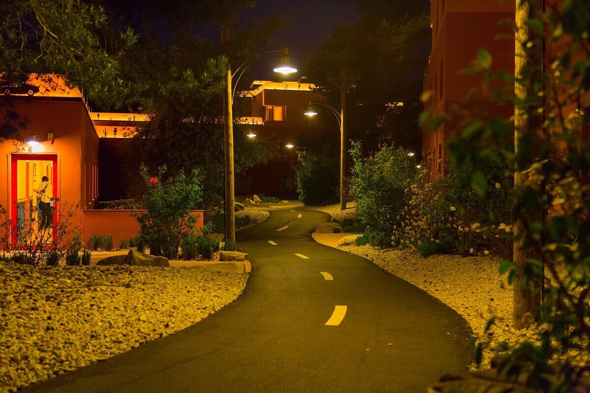 Hotel building Santa Fe at night with Route 66 Route 66 winds through the Mexican-looking landscape of hotel buildings at night.
