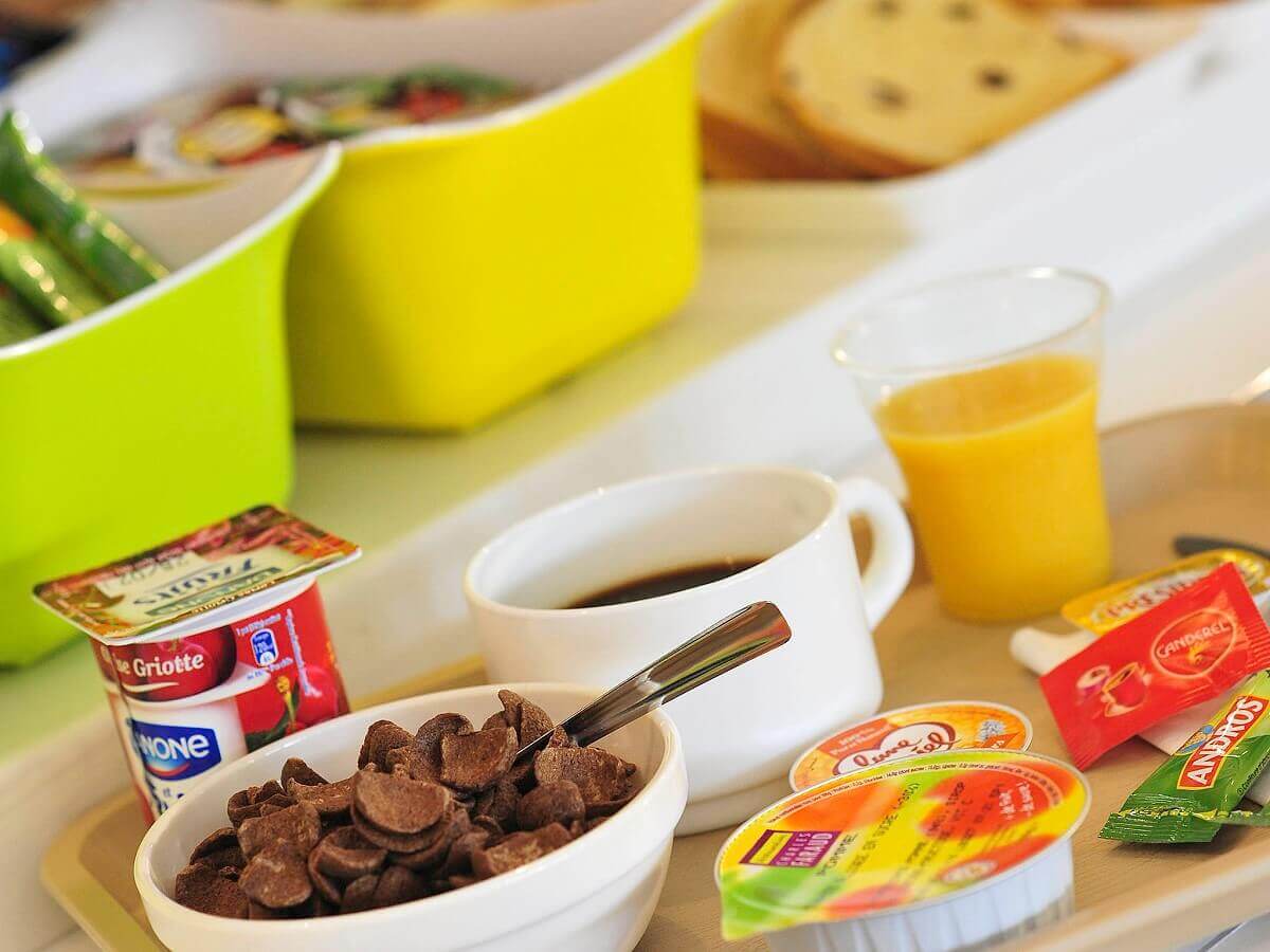 Breakfast Small breakfast at the hotel with cornflakes, yoghurt, coffee and orange juice