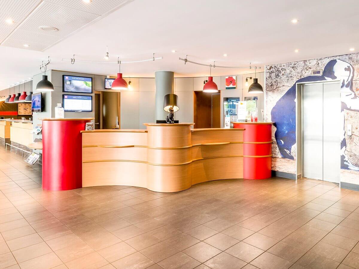 Reception Hotel reception with large reception desk and access to the lifts