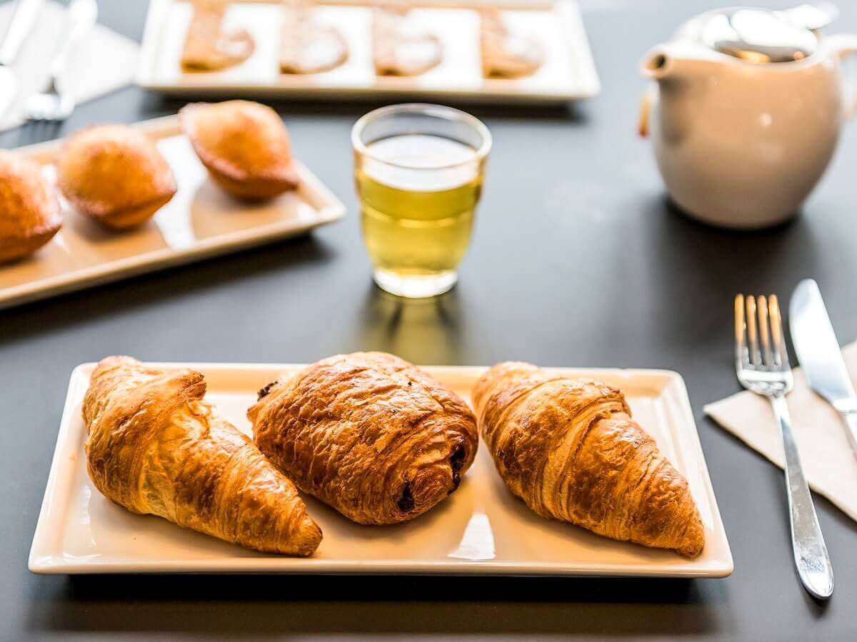 Croissants and Pain au Chocolat Croissants and pain au chocolat, served with green tea