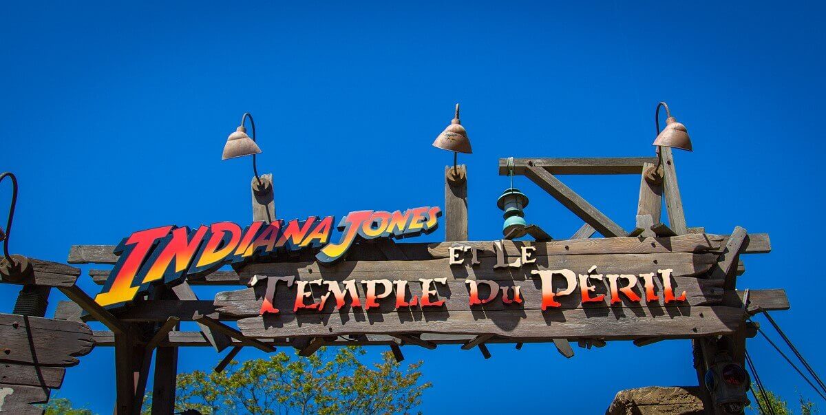 Entrance sign Wooden entrance sign to the attraction Indiana Jones et le Temple du Péril