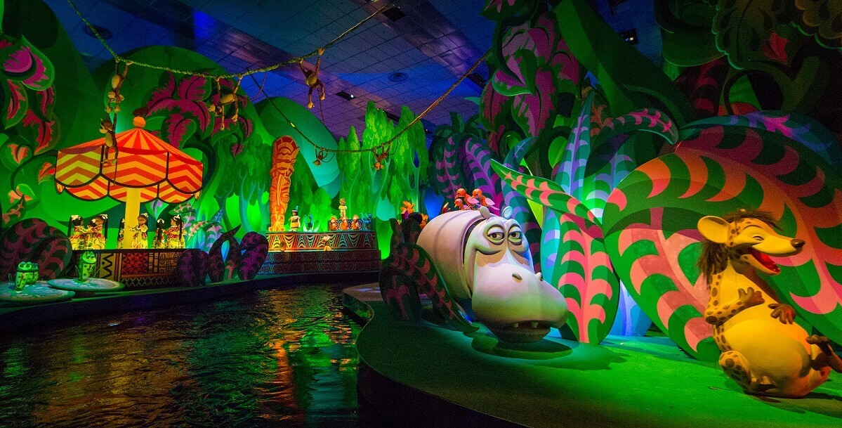Hippopotamus and hyena to the right of the boat at Its a small world a hippopotamus and a laughing hyena are visible in a scene in the jungle area