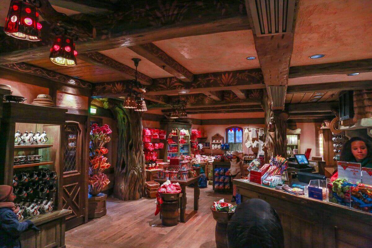 Interior view of the Fairy Confectionery View inside the confectionery in Fantasyland with several shelves and sales areas